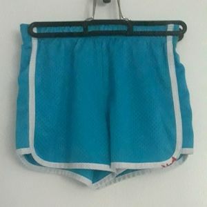 Justice neon blue shorts